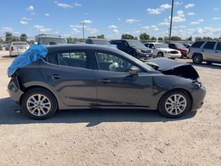 2015 Mazda Mazda3 Hatchback i Grand Touring - Exterior Side Passenger